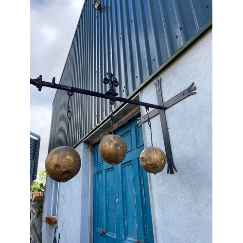 743 - Rare 19th C. Pawnbrokers hanging gilded sign mounted on original wrought iron bracket.