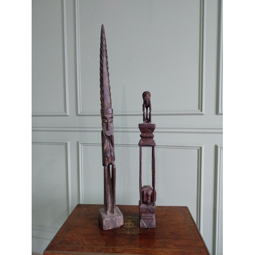 2056 - Two African carved hardwood figures {101 cm H and 70 cm H}.