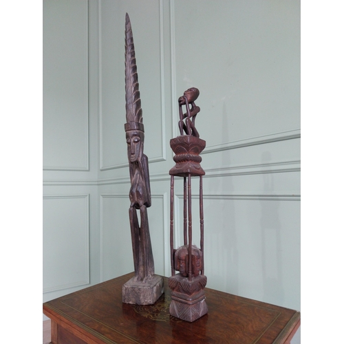 2056 - Two African carved hardwood figures {101 cm H and 70 cm H}.