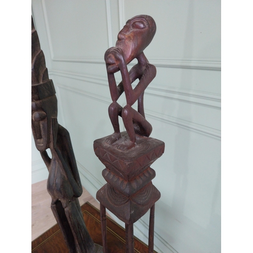 2056 - Two African carved hardwood figures {101 cm H and 70 cm H}.