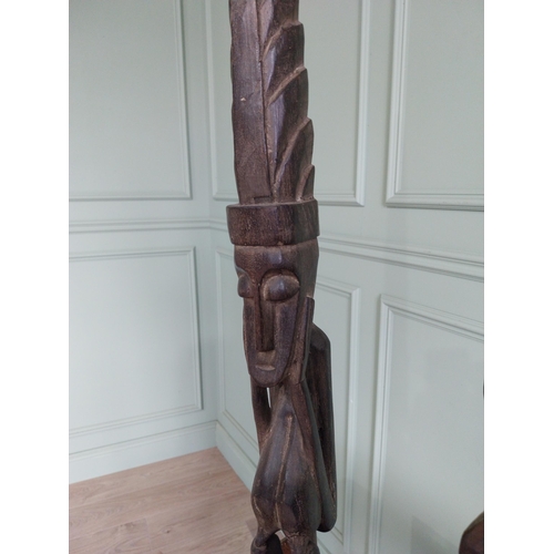 2056 - Two African carved hardwood figures {101 cm H and 70 cm H}.