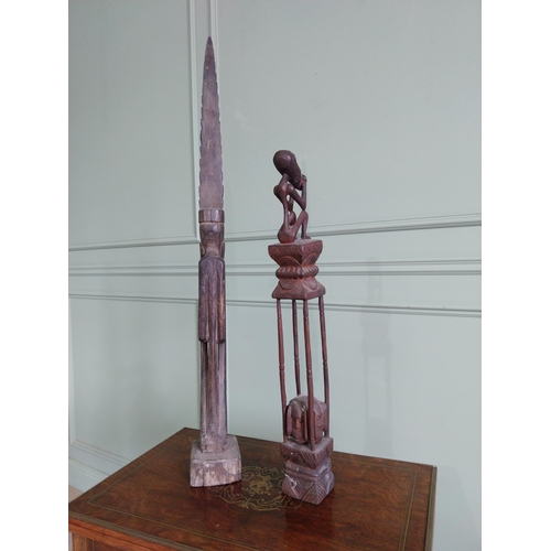 2056 - Two African carved hardwood figures {101 cm H and 70 cm H}.