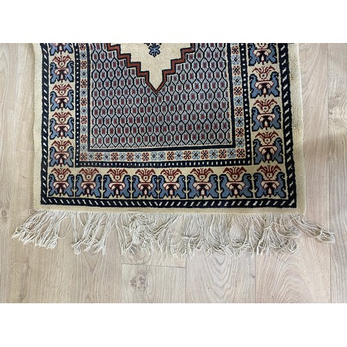 2083 - Pair of decorative rugs {145 cm L x 80 cm W}.