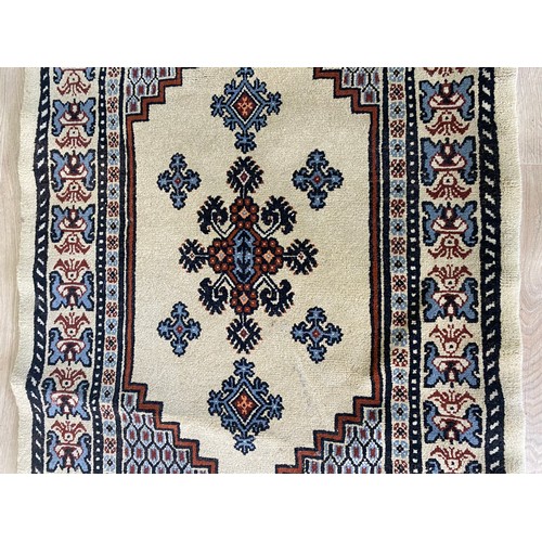 2083 - Pair of decorative rugs {145 cm L x 80 cm W}.