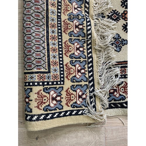 2083 - Pair of decorative rugs {145 cm L x 80 cm W}.