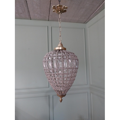 1050 - Decorative French brass and glass teardrop chandelier. {70 cm H x 25 cm Dia.}.