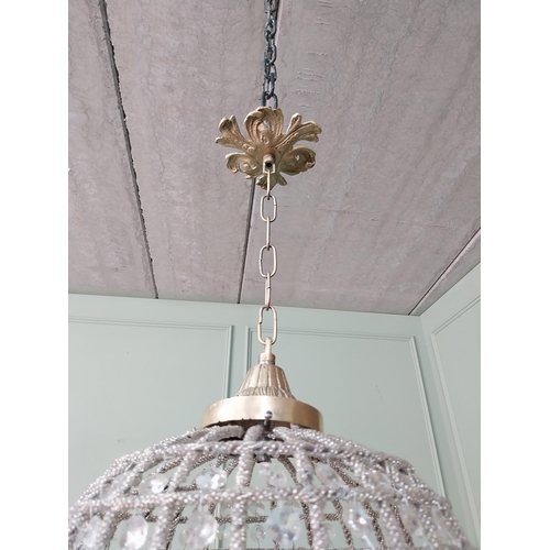 1050 - Decorative French brass and glass teardrop chandelier. {70 cm H x 25 cm Dia.}.