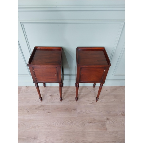 1051 - Pair of mahogany pot cupboards with single door raised on tapered legs {78 cm H x 37 cm W x 34 cm D}... 