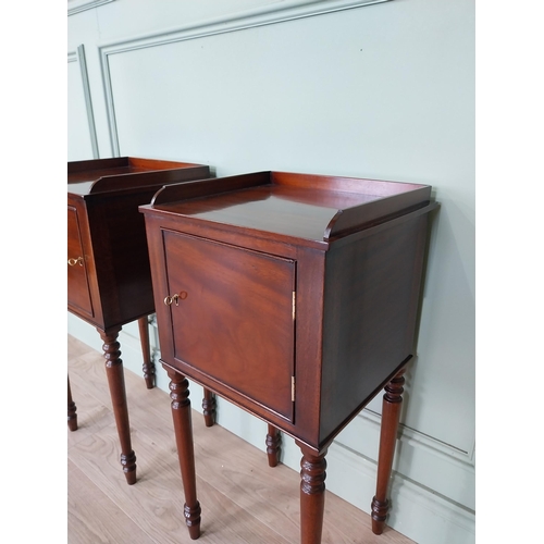 1051 - Pair of mahogany pot cupboards with single door raised on tapered legs {78 cm H x 37 cm W x 34 cm D}... 