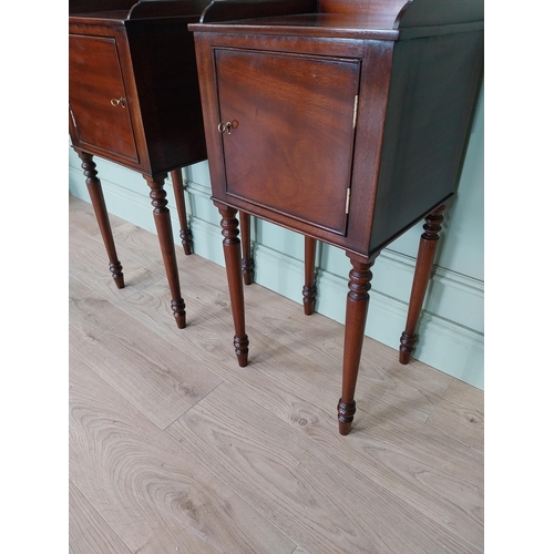 1051 - Pair of mahogany pot cupboards with single door raised on tapered legs {78 cm H x 37 cm W x 34 cm D}... 