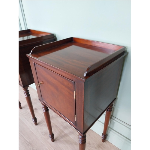 1051 - Pair of mahogany pot cupboards with single door raised on tapered legs {78 cm H x 37 cm W x 34 cm D}... 