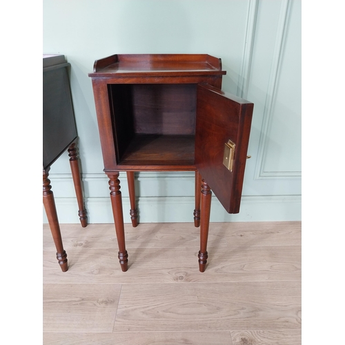 1051 - Pair of mahogany pot cupboards with single door raised on tapered legs {78 cm H x 37 cm W x 34 cm D}... 