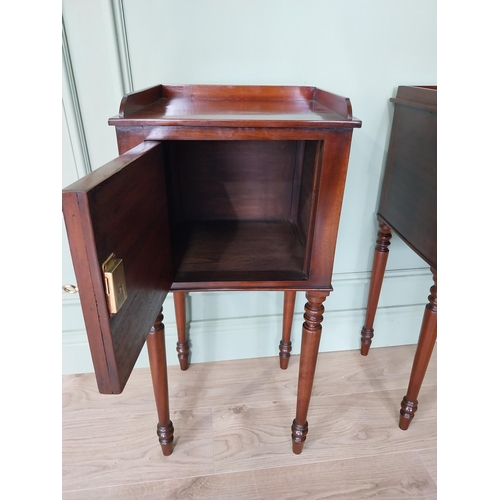 1051 - Pair of mahogany pot cupboards with single door raised on tapered legs {78 cm H x 37 cm W x 34 cm D}... 