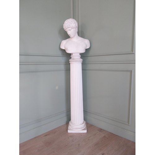 1091 - Early 20th C. plaster bust raised on reeded column {}.