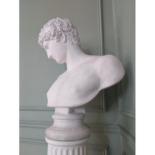 1091 - Early 20th C. plaster bust raised on reeded column {}.