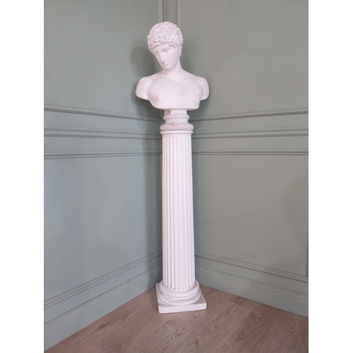 1091 - Early 20th C. plaster bust raised on reeded column {}.