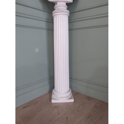 1091 - Early 20th C. plaster bust raised on reeded column {}.