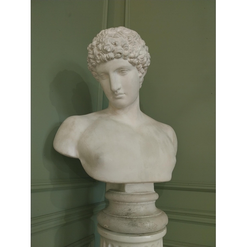 1091 - Early 20th C. plaster bust raised on reeded column {}.