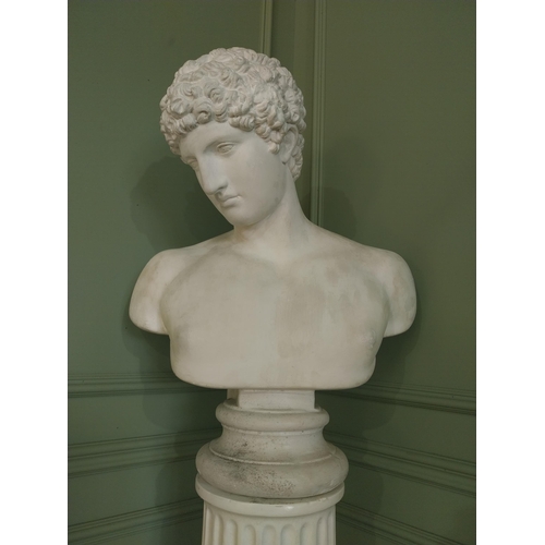 1091 - Early 20th C. plaster bust raised on reeded column {}.