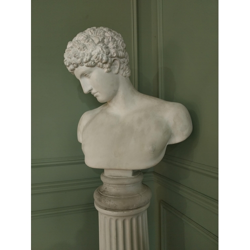 1091 - Early 20th C. plaster bust raised on reeded column {}.