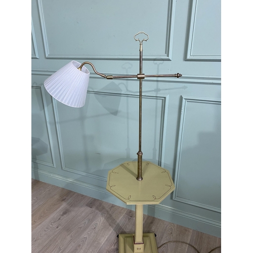 624 - Pair of brass telescopic standard lamps with cloth shades raised on painted wooden bases and bronzed... 