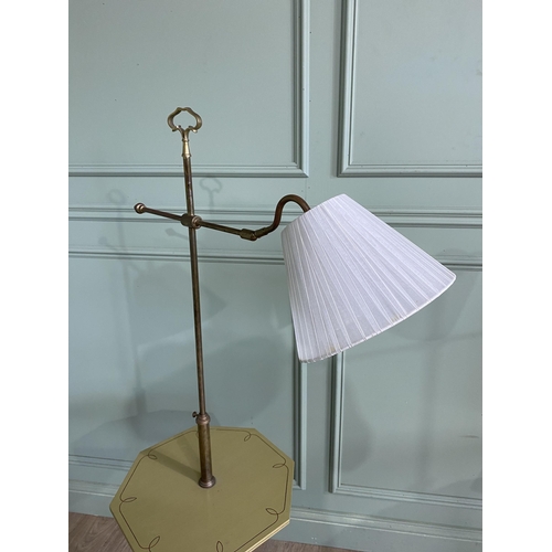 624 - Pair of brass telescopic standard lamps with cloth shades raised on painted wooden bases and bronzed... 