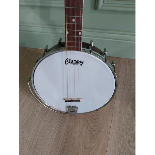 888 - The Gibson four string tenor Banjo.