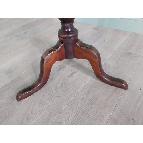 1132 - 19th C. mahogany wine table with satinwood inlay raised on turned column and three outswept feet {76... 