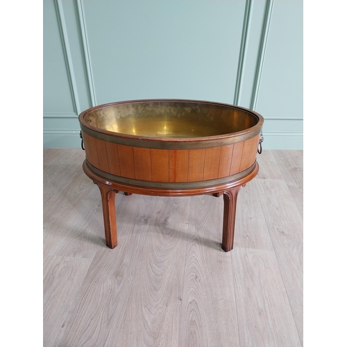 749 - Good quality mahogany brass bound wine cooler with brass handles raised on square legs in the Georgi... 