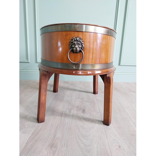 749 - Good quality mahogany brass bound wine cooler with brass handles raised on square legs in the Georgi... 