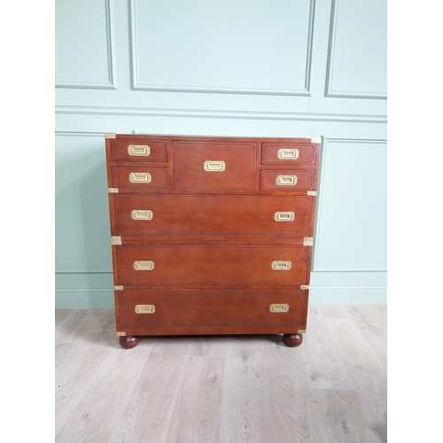 1062 - Exceptional quality mahogany brass bound campaign style chest of drawers raised on bun feet {104 cm ... 