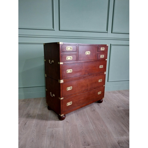 1062 - Exceptional quality mahogany brass bound campaign style chest of drawers raised on bun feet {104 cm ... 