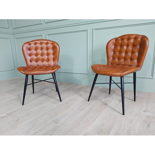 1382 - Pair of hand dyed leather deep buttoned side chairs raised on metal tapered legs {90 cm H x 59 cm W ... 