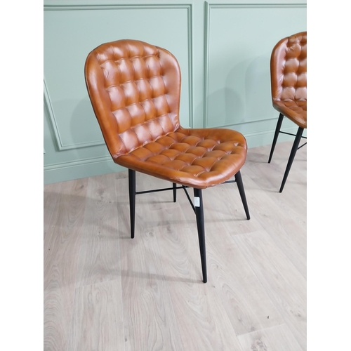 1382 - Pair of hand dyed leather deep buttoned side chairs raised on metal tapered legs {90 cm H x 59 cm W ... 