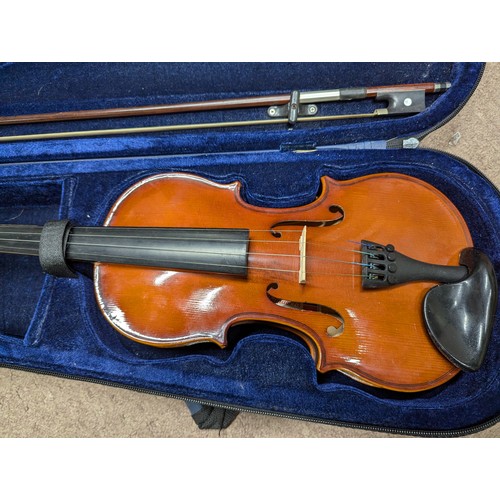 109 - Primavera violin in case with bow {Case: 79cm W x 13cm H x 26cm D}