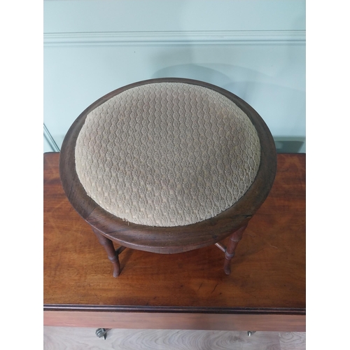 2089 - 19th C. rosewood foot stool raised on turned tapered legs {37 cm H x 43 cm Dia.}.