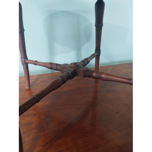 2089 - 19th C. rosewood foot stool raised on turned tapered legs {37 cm H x 43 cm Dia.}.