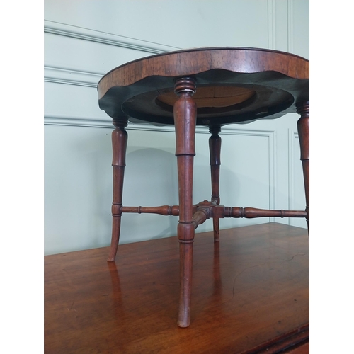 2089 - 19th C. rosewood foot stool raised on turned tapered legs {37 cm H x 43 cm Dia.}.