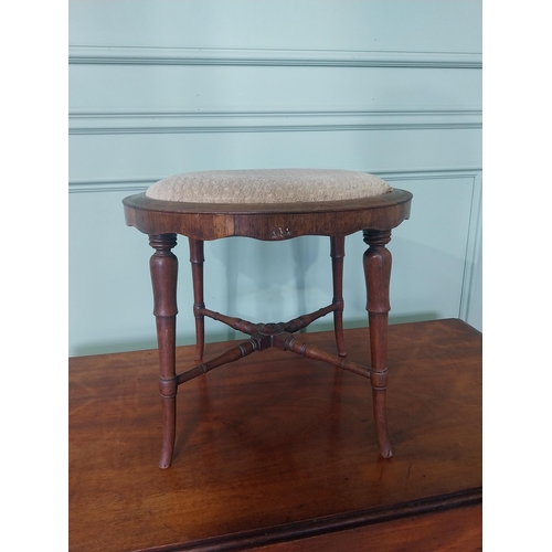 2089 - 19th C. rosewood foot stool raised on turned tapered legs {37 cm H x 43 cm Dia.}.