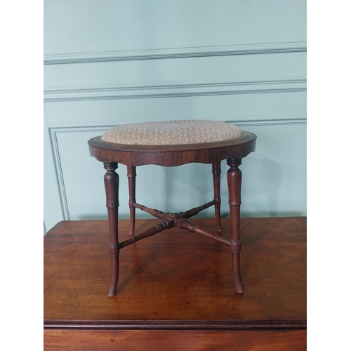 2089 - 19th C. rosewood foot stool raised on turned tapered legs {37 cm H x 43 cm Dia.}.