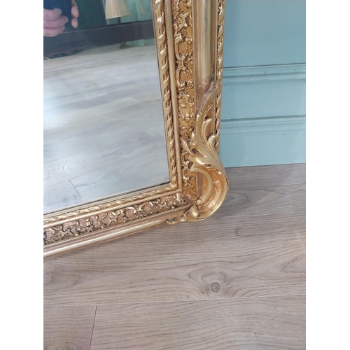 2090 - Decorative French gilt wall mirror in the Victorian style {158 cm H x 85 cm W}.