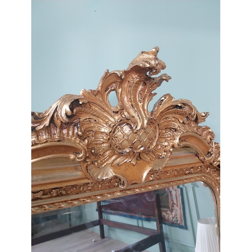 2090 - Decorative French gilt wall mirror in the Victorian style {158 cm H x 85 cm W}.