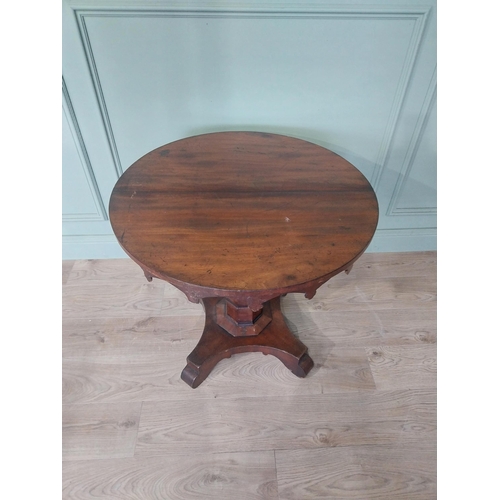 2092 - Willian IV Gothic revival mahogany centre table raised on platform base {71 cm H x 77 cm Dia.}.