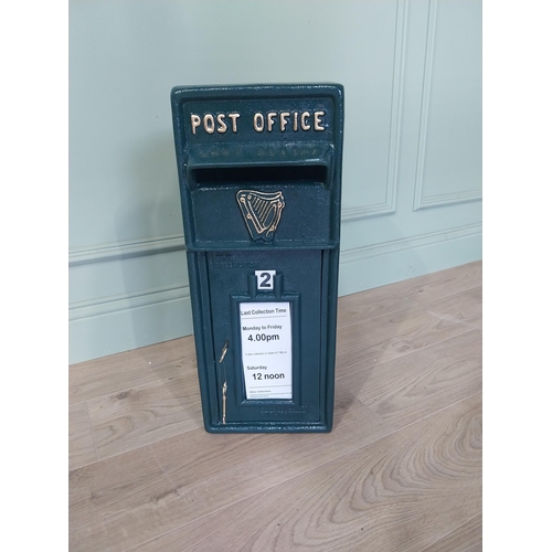 2103 - Irish cast iron and metal post box {57 cm H x 24 cm W x 37 cm D}.