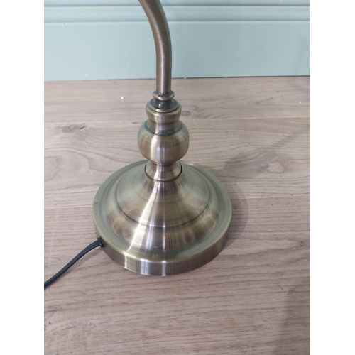 2108 - Brushed brass bankers lamp with green glass shade {42 cm H x 28 cm W x 18 cm D}.