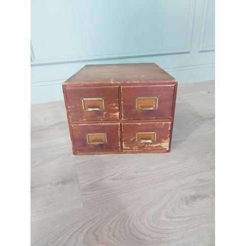 2111 - 1940s oak and pine desk bank of four drawers {26 cm H x 34 cm W x 44 cm D }.