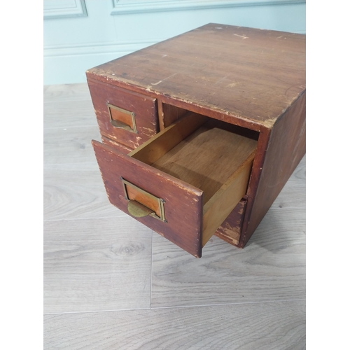 2111 - 1940s oak and pine desk bank of four drawers {26 cm H x 34 cm W x 44 cm D }.