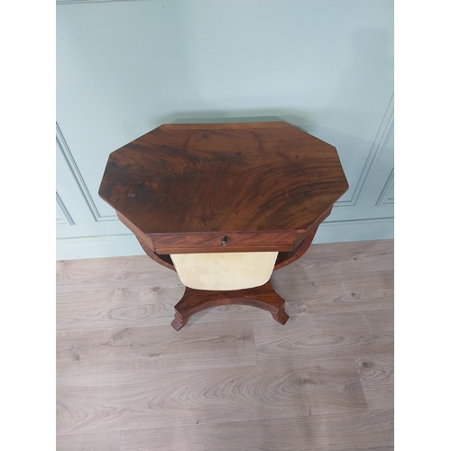 2114 - 19h C. mahogany work table raised on platform base, four outswept feet and castors {75 cm H x 62 cm ... 