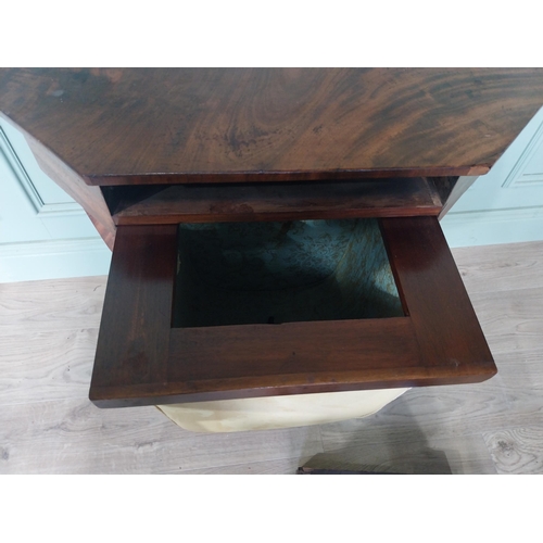 2114 - 19h C. mahogany work table raised on platform base, four outswept feet and castors {75 cm H x 62 cm ... 