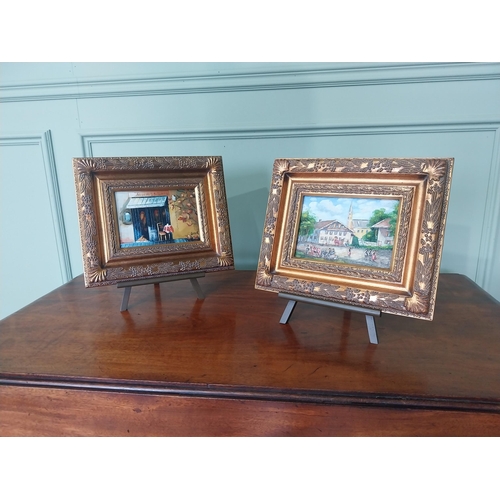 2122 - Pair of French oleographs mounted in gilt frames raised on table top easels {26 cm H x 31 cm D}.